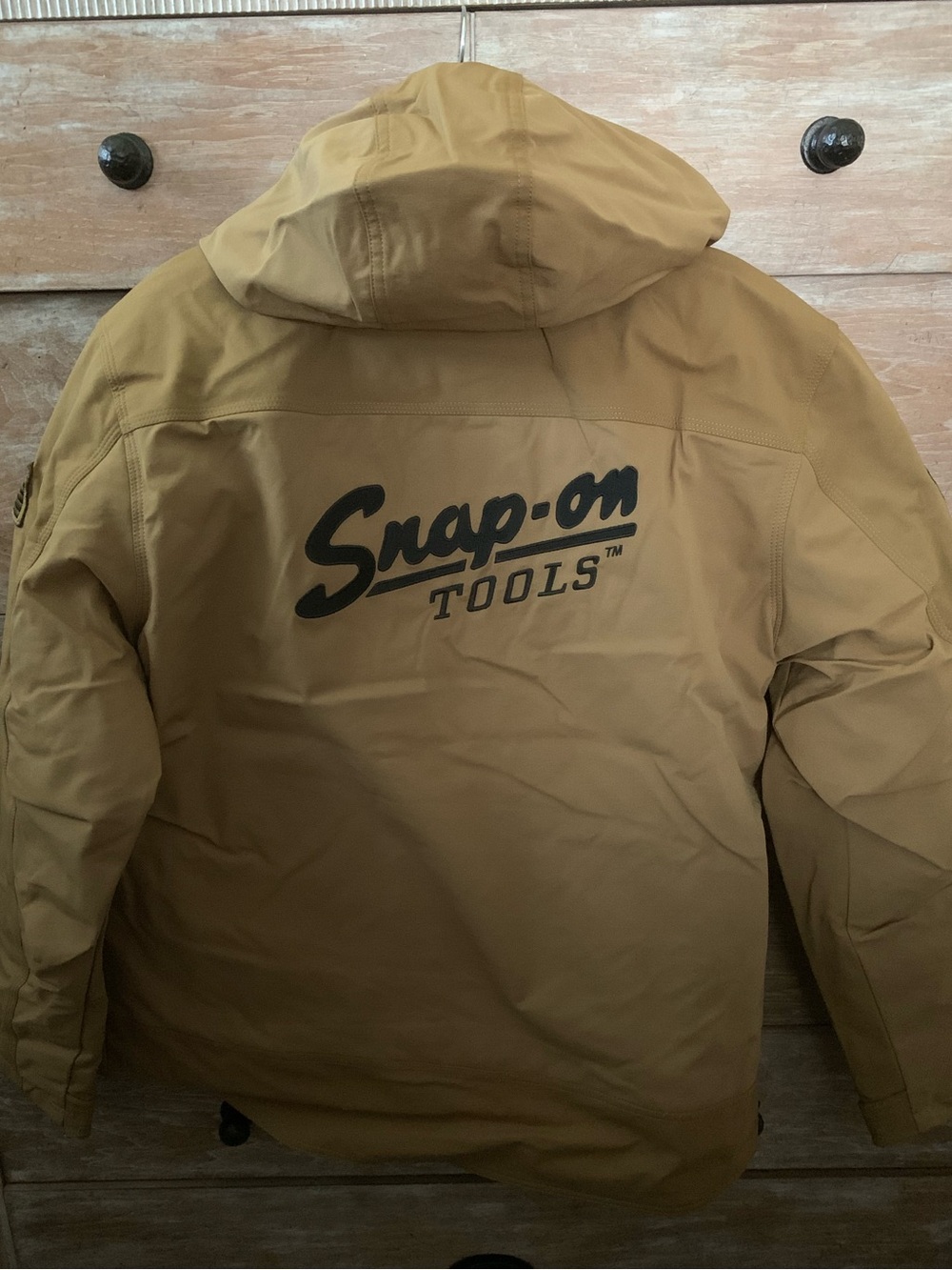 NWT Snap On Legend hooded coat. In the packaging